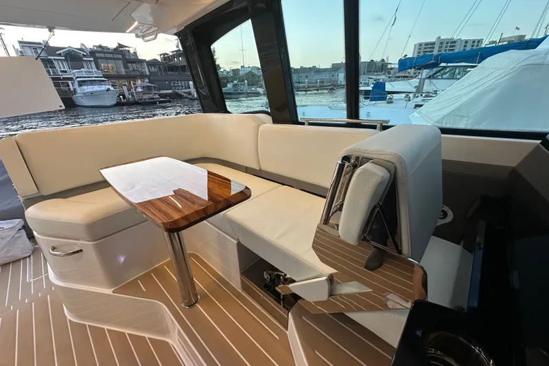 Slide: The Image of Luxurious interior of 2027 Tiara Yachts 39 LE with elegant seating and waterfront view. - 19