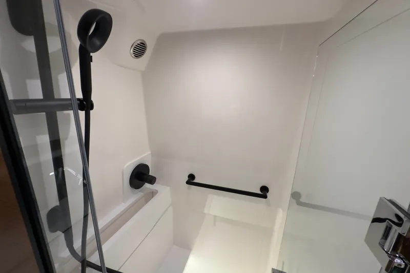 Slide: The Image of Modern shower area in 2027 Tiara Yachts 39 LE, featuring sleek fixtures and glass door. - 31