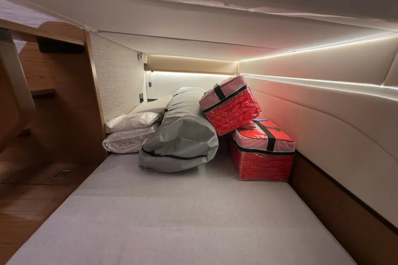 Slide: The Image of Interior cabin storage of 2027 Tiara Yachts 39 LE with neatly packed items. - 29
