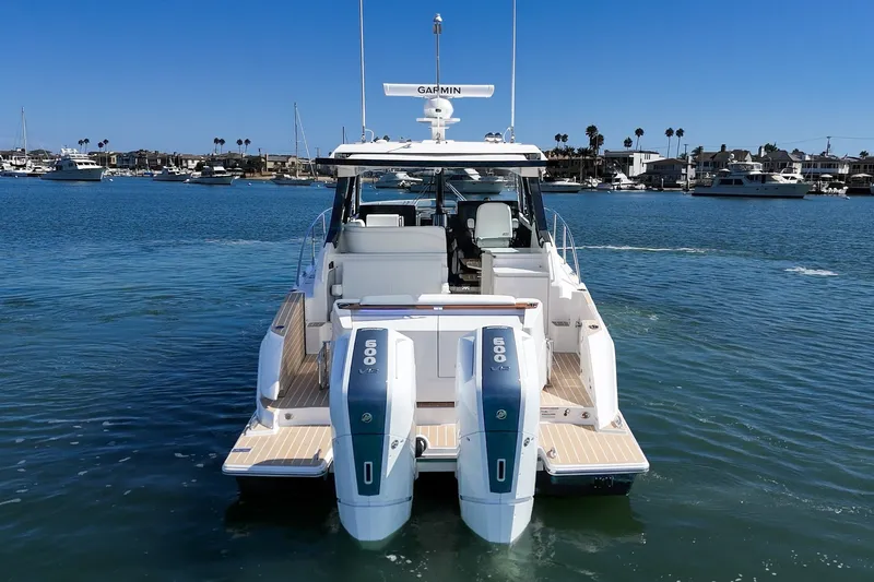 Slide: The Image of 2027 Tiara Yachts 39 LE with twin engines on calm water. - 27