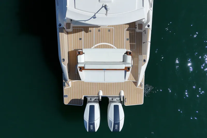 Slide: The Image of Overhead view of 2027 Tiara Yachts 39 LE with twin engines on water. - 26