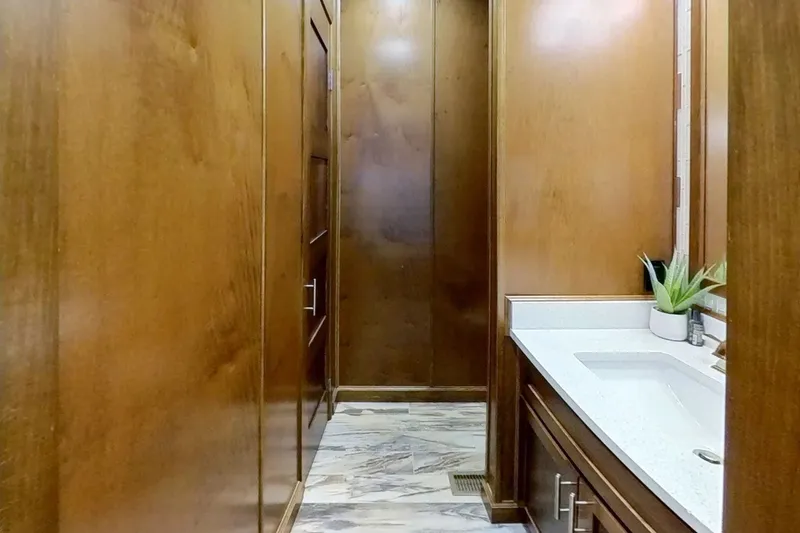 Slide: The Image of Luxurious wooden bathroom interior with modern sink and marble flooring, Thoroughbred 21 x 100, 2016. - 17