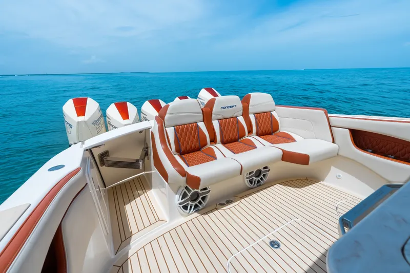 Slide: The Image of 2024 Concept 44' Open Deck boat with luxurious seating and powerful engines on open water. - 28