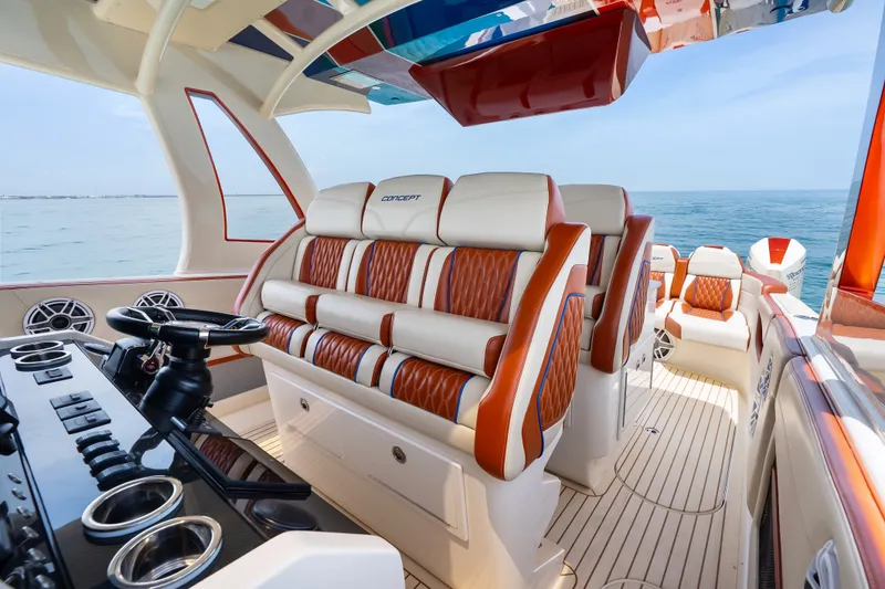 Slide: The Image of Luxurious 2024 Concept 44' Open Deck boat interior with plush seating and modern controls. - 22