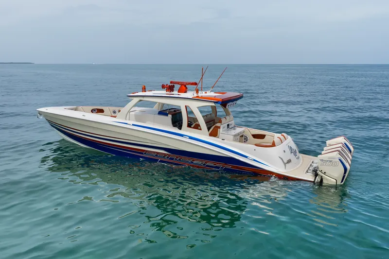 Slide: The Image of 2024 Concept 44' Open Deck boat on calm ocean waters, showcasing sleek design and powerful engines. - 15