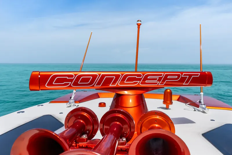 Slide: The Image of 2024 Concept 44' Open Deck boat with vibrant orange accents on open water. - 42