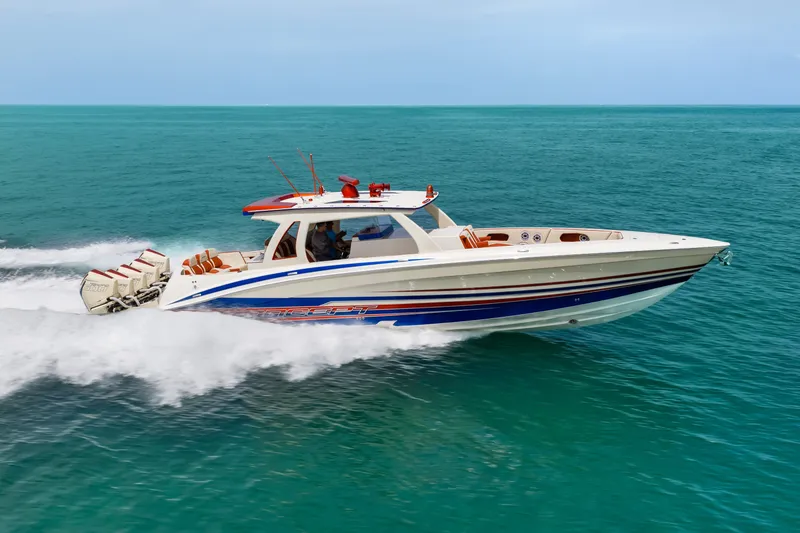 The Image of 2024 Concept 44' Open Deck boat cruising on turquoise ocean waters. - 0