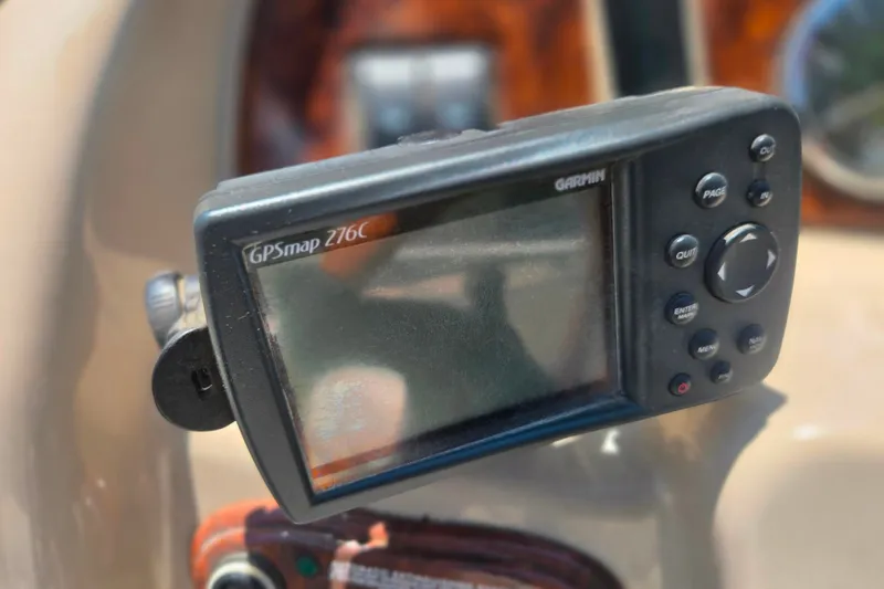 Slide: The Image of Garmin GPSmap 276C mounted on 2004 Sea Ray 240 Sundancer dashboard. - 25