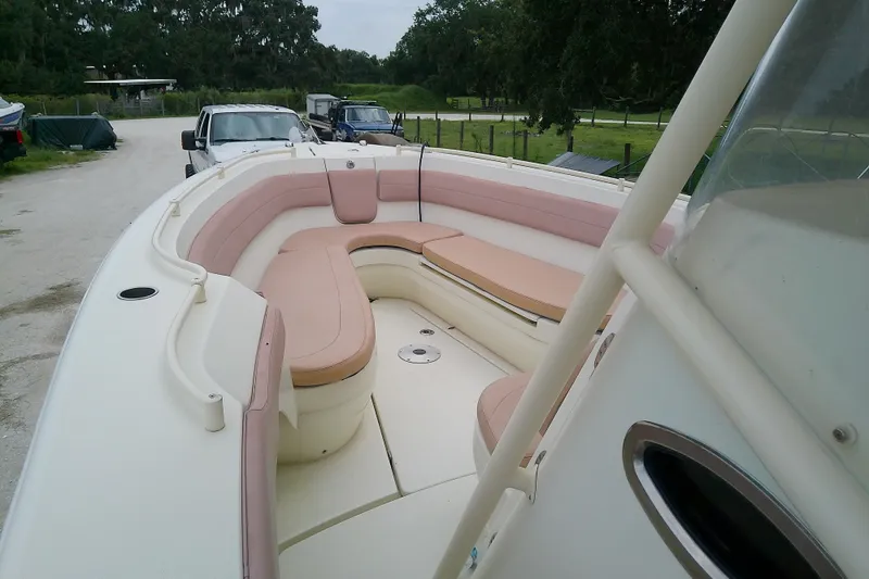 Slide: The Image of 2016 Release 301 RXS boat with spacious seating and sleek design. - 30