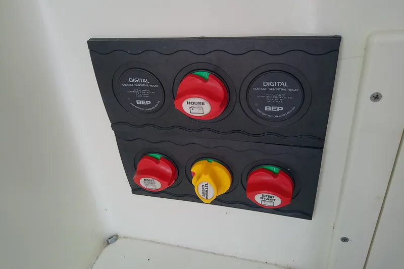 Slide: The Image of Control panel with digital voltage sensitive relays on a 2016 Release 301 RXS boat. - 36