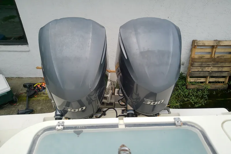 Slide: The Image of Twin Yamaha 300 outboard motors on a boat, viewed from above. - 25