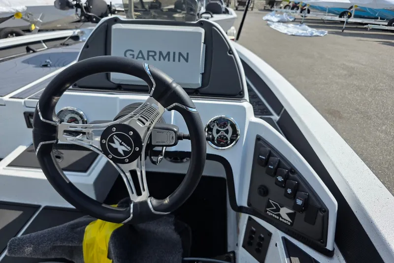Slide: The Image of Steering console of 2027 Xpress X19 Pro boat with Garmin navigation system. - 16