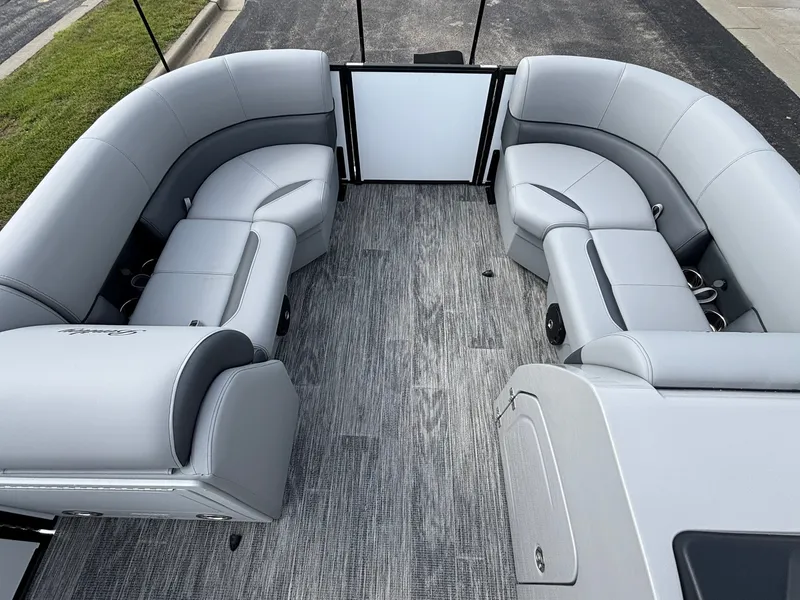 Slide: The Image of The image shows the interior of a 2027 Bentley Pontoons 200 Legacy Swingback with gray upholstered seating. - 14