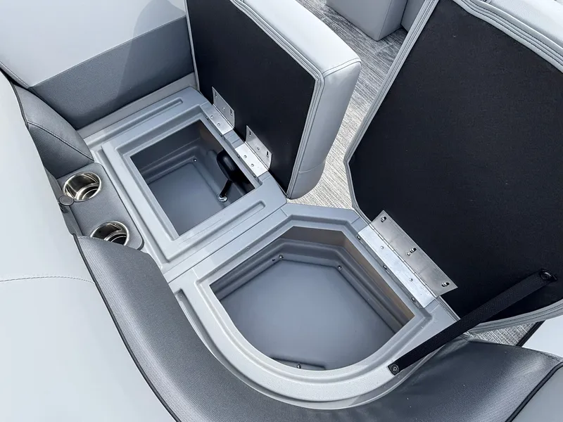 Slide: The Image of The 2027 Bentley Pontoons 200 Legacy Swingback features open storage compartments with gray upholstery. - 7