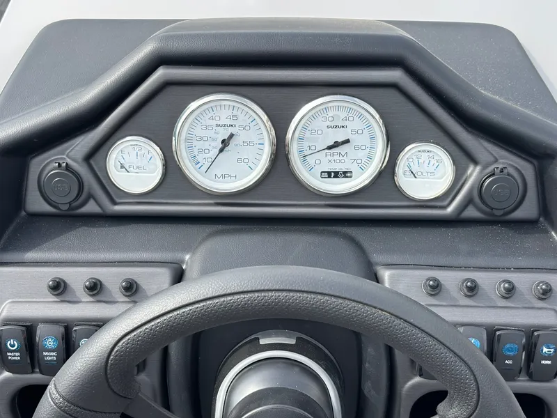 Slide: The Image of Dashboard of a Bentley Pontoons 200 Legacy Swingback with speedometer and fuel gauge. - 21
