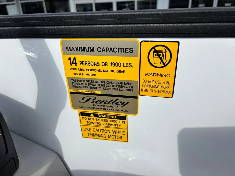 Slide: The Image of Safety stickers on a boat with capacity and warning information. - 24