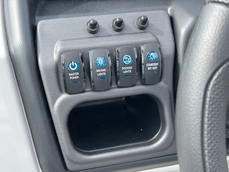 Slide: The Image of Switch panel with buttons for master power, navigation lights, docking lights, and courtesy interior lights. - 20