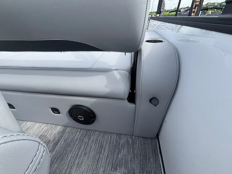 Slide: The Image of Interior of a 2027 Bentley Pontoons 200 Legacy Swingback with gray upholstery and speaker. - 27