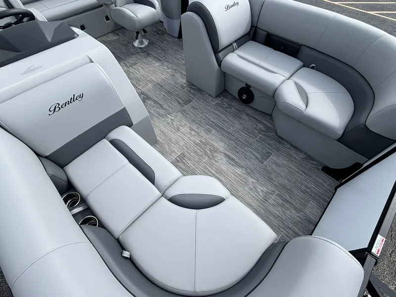 Slide: The Image of Interior of a Bentley Pontoons 200 Legacy Swingback with gray upholstery and modern design. - 6