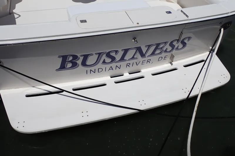 Slide: The Image of 2005 Bertram 390 boat named "Business" docked at Indian River, DE. - 19