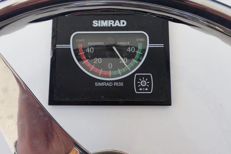 Slide: The Image of Simrad RI35 rudder angle indicator on a 2005 Bertram 390 yacht. - 46