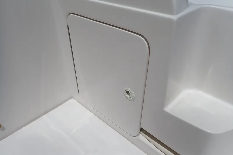 Slide: The Image of Compartment door on a 2005 Bertram 390 boat interior. - 17