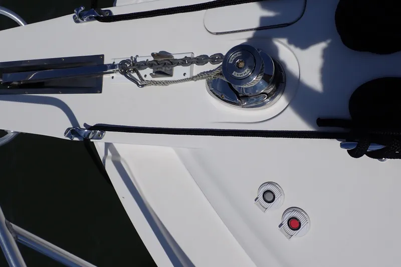Slide: The Image of Bow deck of 2005 Bertram 390 yacht with anchor winch and controls. - 29