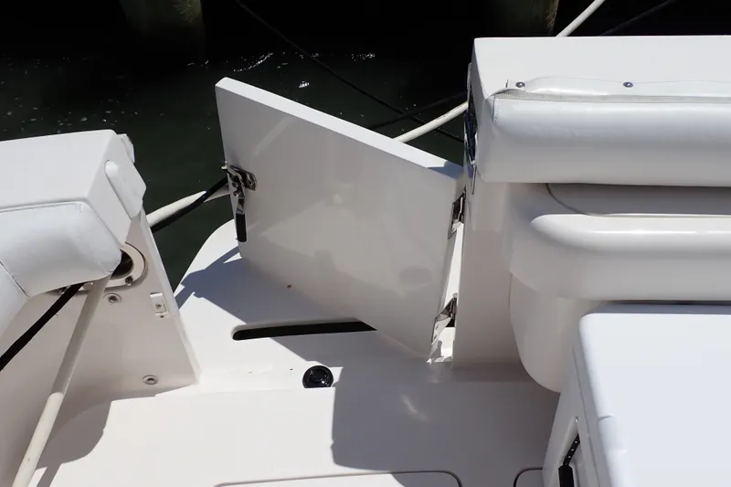 Slide: The Image of 2005 Bertram 390 boat interior with open hatch and seating area. - 21
