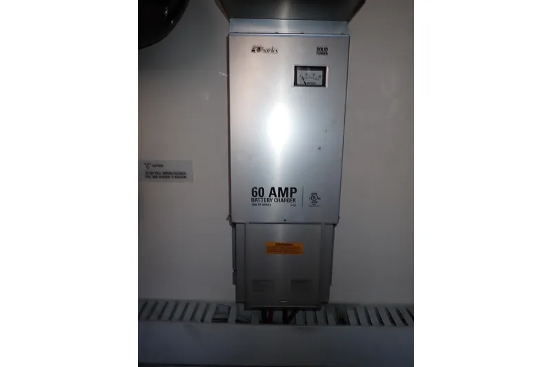 Slide: The Image of 60 AMP battery charger on a 2005 Bertram 390 yacht. - 125