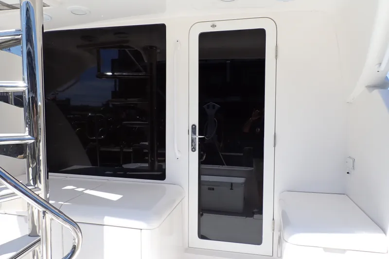Slide: The Image of 2005 Bertram 390 yacht interior with sleek door and window design. - 8