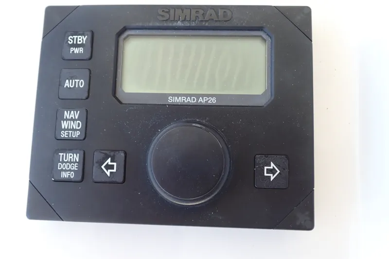 Slide: The Image of Simrad AP26 autopilot control panel on a 2005 Bertram 390 boat. - 47