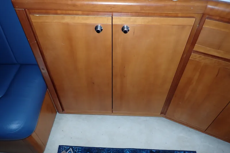 Slide: The Image of Wooden cabinet doors on a 2005 Bertram 390 yacht interior. - 73