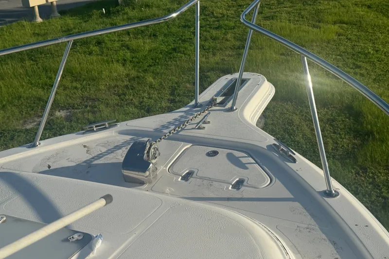 Slide: The Image of Bow of 2006 Pro-Line 35 Express boat with anchor chain and railing. - 34