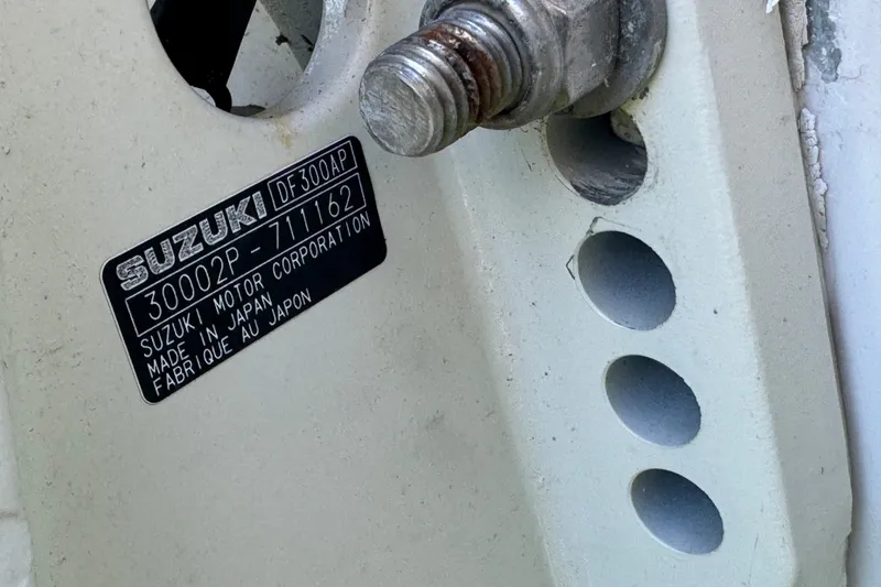 Slide: The Image of Close-up of Suzuki DF300AP engine plate on 2006 Pro-Line 35 Express boat. - 21