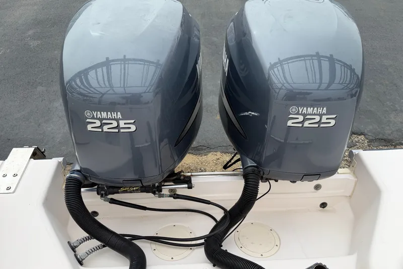Slide: The Image of Twin Yamaha 225 outboard engines on a 2002 Grady White 273 Chase boat. - 21