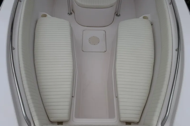 Slide: The Image of Interior view of 2002 Grady White 273 Chase boat with white cushioned seating. - 6