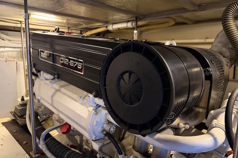 Slide: The Image of Engine room of 2002 Carver 570 Voyager Pilothouse with D12-675 engine. - 18