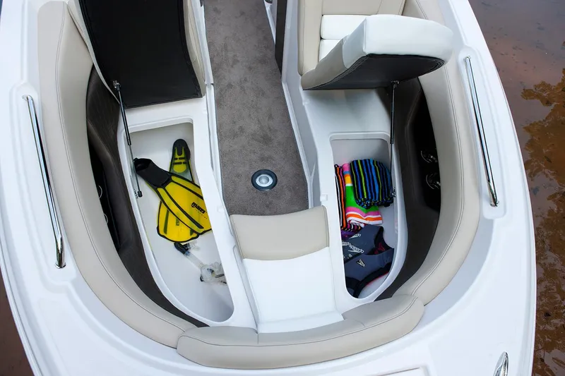Slide: The Image of Manufacturer Provided Image: 2017 Regal 2700 ES Bowrider interior storage compartments with gear. - 18