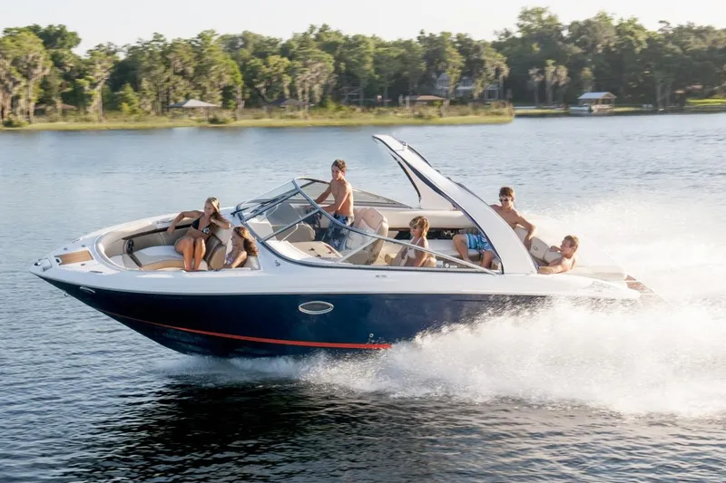 Slide: The Image of Manufacturer Provided Image: 2017 Regal 2700 ES Bowrider cruising on a lake with passengers. - 14