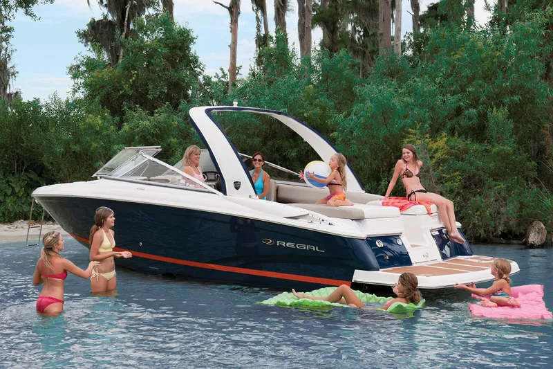 Slide: The Image of Manufacturer Provided Image: 2017 Regal 2700 ES Bowrider with people enjoying water activities. - 17