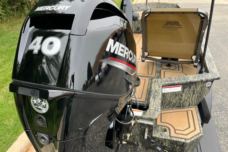 Slide: The Image of 2026 Tracker Grizzly 1650 T Prairie Wings Edition with Mercury 40 outboard motor. - 15