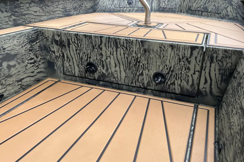 Slide: The Image of Interior of 2026 Tracker Grizzly 1650 T Prairie Wings Edition boat with camo design. - 19