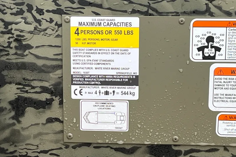 Slide: The Image of Capacity label on 2026 Tracker Grizzly 1650 T Prairie Wings Edition boat, showing safety and compliance details. - 17