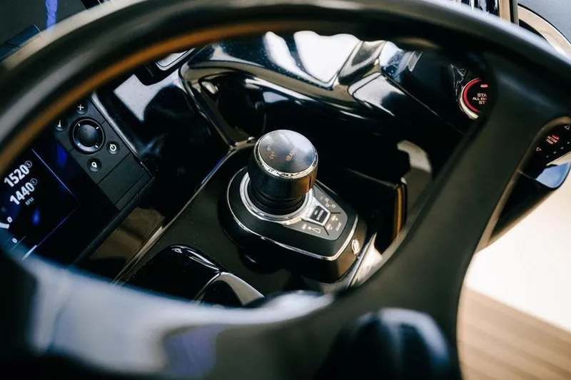 Slide: The Image of Cockpit controls of 2022 Scout 425 LXF boat, featuring advanced navigation technology. - 22