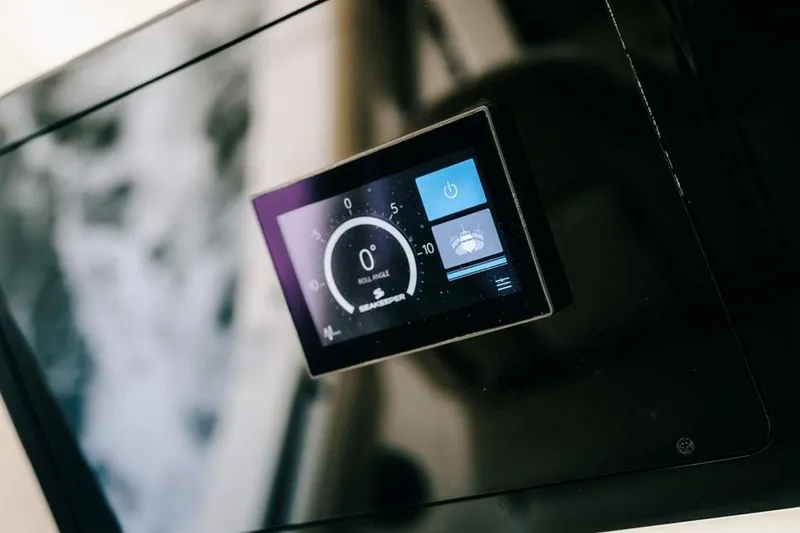 Slide: The Image of Digital control panel on 2022 Scout 425 LXF boat dashboard. - 24