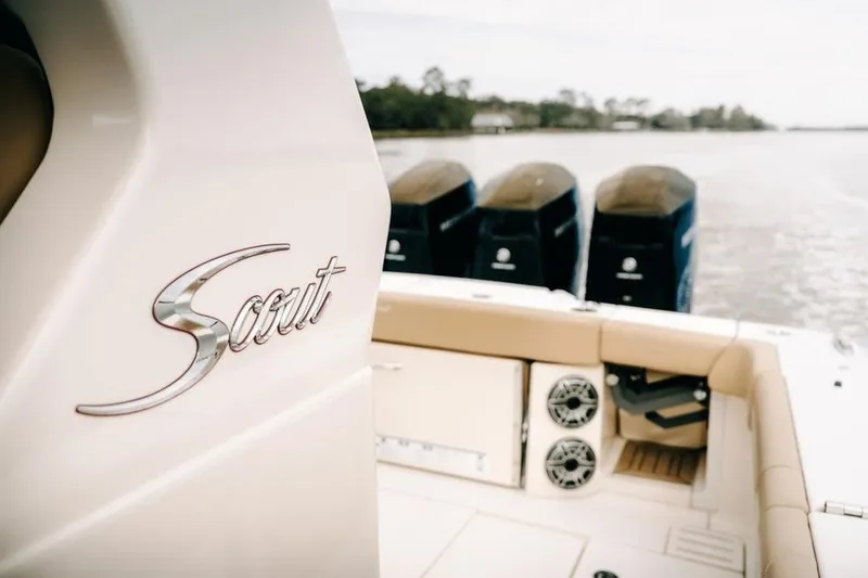 Slide: The Image of 2022 Scout 425 LXF boat with quad engines and luxurious seating. - 36
