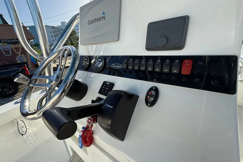Slide: The Image of Center console of 2021 Pair Customs 21 Center Console MV with Garmin navigation system. - 30