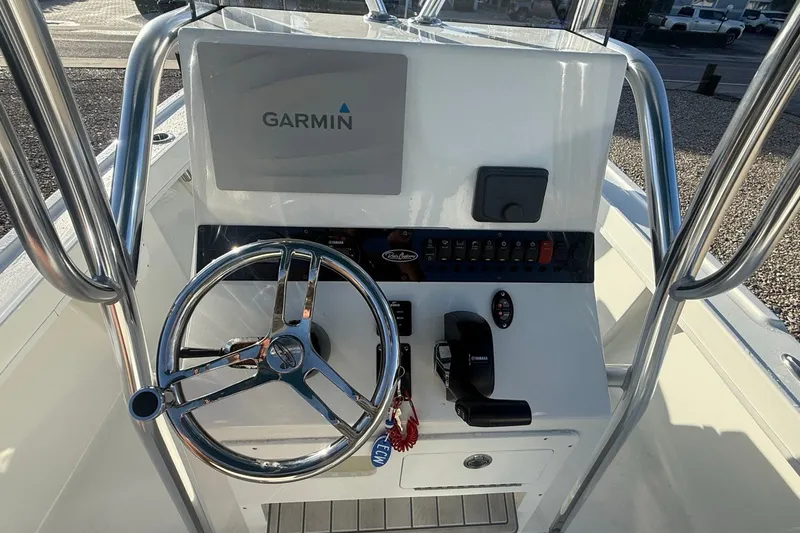 Slide: The Image of Center console of 2021 Pair Customs 21 Center Console MV with Garmin display and steering wheel. - 17