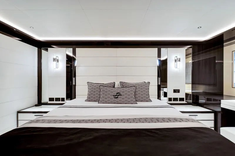 Slide: The Image of Luxurious bedroom interior on 2021 Sirena 88 yacht, featuring modern design and elegant lighting. - 125
