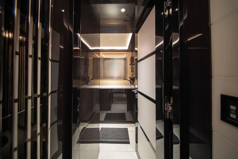 Slide: The Image of Luxurious interior of 2021 Sirena 88 yacht with modern design and ambient lighting. - 97
